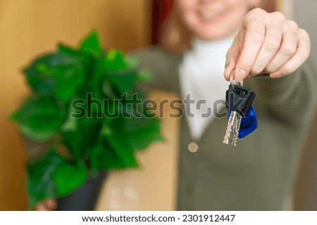 Starting new life. Overjoyed woman hold keys from new apartment or home. new life starts now. Excited woman proud of becoming homeowner first time. loan, mortgage concept Royalty-Free Stock Photo #2301912447