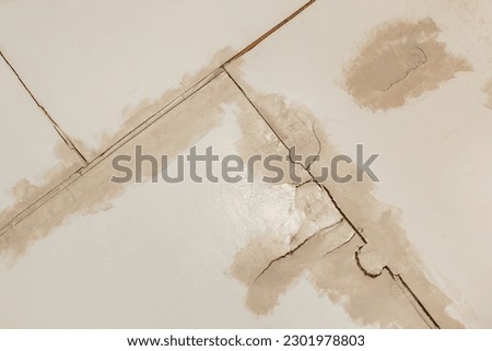 Cracked old surface disturbed wall crack texture background wear effect.