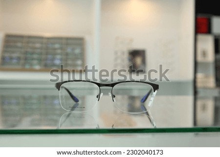 Closeup of glasses in eyeglasses shop