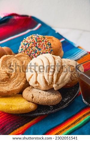 Traditional mexican sweet bread on rustic background Royalty-Free Stock Photo #2302051541