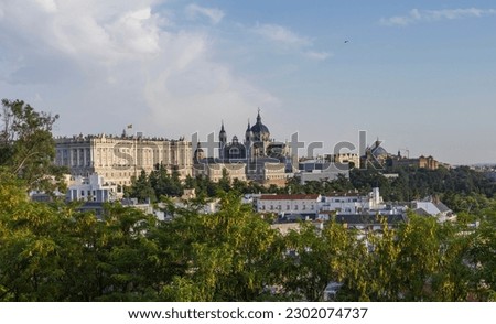 Cityscape of Madrid with some landmarks like Santa María la Real de la Almudena Cathedral and the Royal Palace of Madrid, the official residence of the Spanish royal family. Spain.