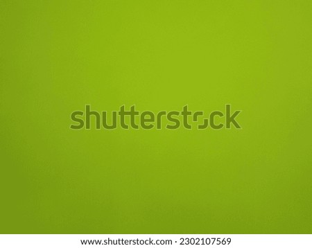 Bright green paper surface as a background. High quality photo