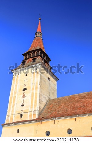 Tower of Saxon fortified church in Feldioara village, Transylvania, Romania