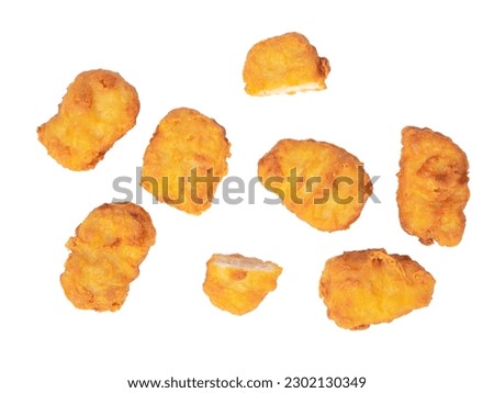 Fried chicken nuggets isolated on white background Royalty-Free Stock Photo #2302130349