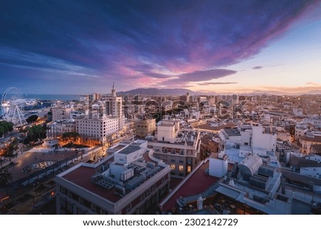 Aerial view of Malaga at sunset with La Equitativa Building - Malaga, Andalusia, Spain