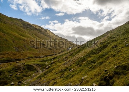Beautiful countryside drive in a hilly terrain from London to Lake District