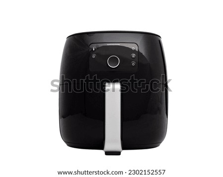 Black fryer on a white background. Deep fryer close-up. Royalty-Free Stock Photo #2302152557