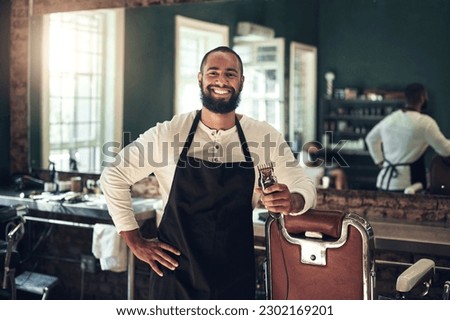 Barber shop, hair clipper and black man portrait of an entrepreneur with a smile. Salon, professional worker and male person face with happiness and proud from small business and beauty parlor Royalty-Free Stock Photo #2302169201