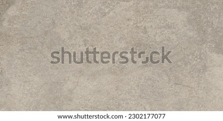 Gray rough old concrete wall texture. Textured cement plaster surface with small cracks. Wide grunge background texture
