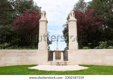 Main entrance to the Military Commonwealth War Graves for WO I and WOII soldiers with crossat the monument at the Cemetery in Etaples, France