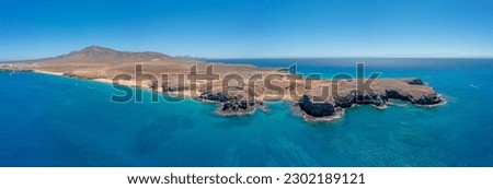 Drone picture from Los Ajaches National Park on the Canary Island Lanzarote during the day with the famous Papagaqyo Beaches