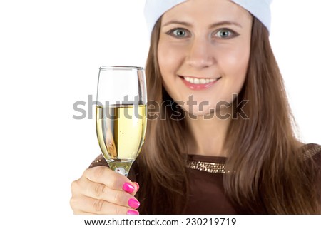 Young woman holding the glass of champagne on white background
