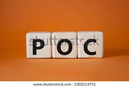 POC - Proof of Concept symbol. Wooden cubes with words POC. Beautiful orange background. Business and POC concept. Copy space.