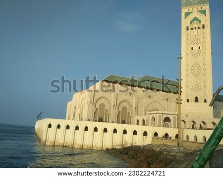 The famous mosque in Casablanca in Morocco, Africa is purposefully built on the shores of the Atlantic Ocean since there is a story about how its architect was inspired by a text from the Qur'an Royalty-Free Stock Photo #2302224721