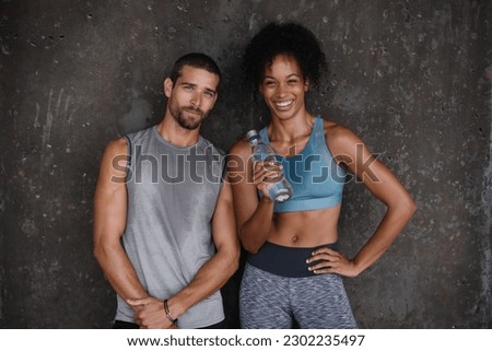 Fitness, happy and portrait of couple with water after workout, body builder training and exercise outdoors. Sports, relationship and man and woman after running for endurance, wellness and energy Royalty-Free Stock Photo #2302235497