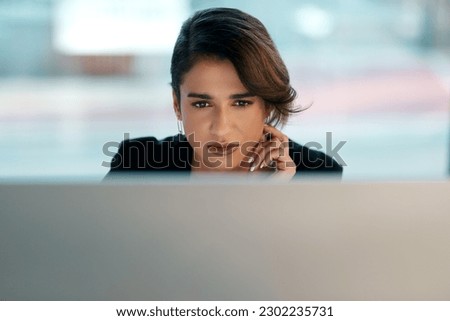 Business woman, computer and thinking, reading or online management for software data, review or solution in office. Planning, focus and problem solving of professional worker or person on desktop pc