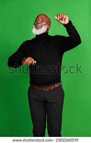 Happy, dance and smile with black man on green screen for celebration, music or excited. Happiness, dancer and energy with senior person dancing isolated on studio background for freedom and movement