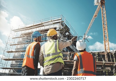Engineering, construction site and team outdoor for building project, planning and architecture. Black woman and men contractor together for development and safety assessment discussion in city Royalty-Free Stock Photo #2302260717