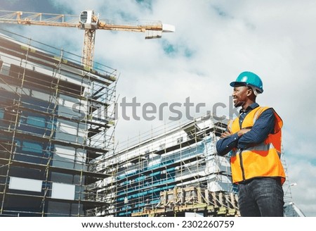 Engineer, construction and a man thinking of development at building site with architecture. Black male contractor happy about project management, engineering and safety inspection outdoor in city