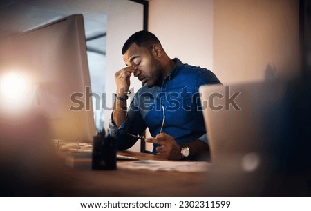 Headache, eye strain and businessman in the office at night working on deadline project. Burnout, stress and professional male employee with migraine doing research on computer overtime in workplace. Royalty-Free Stock Photo #2302311599