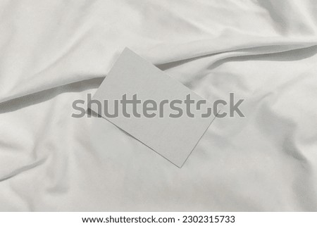 Business Card On White Fabric Mockup