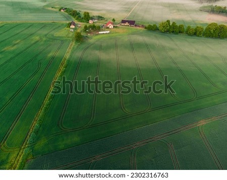 Majestic Sunrise Over a Serene Drone Landscape of Northern Europe Royalty-Free Stock Photo #2302316763