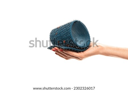 Orthopedic mat with spikes isolated over the white background. Blue massage mat. . High quality photo