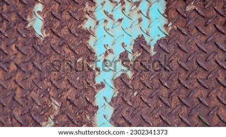 High-res stock image of rusted metal plates with light blue paint remnants or leftovers, the unique rustic metal patterns is perfect for texture and background use. Stock photography.