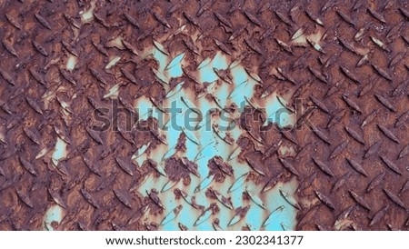 High-res stock image of rusted metal plates with light blue paint remnants or leftovers, the unique rustic metal patterns is perfect for texture and background use. Stock photography.