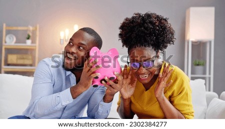 Personal Finance And Young Couple Family Money Royalty-Free Stock Photo #2302384277