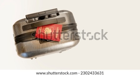 Travel baggage with passport. Russian passport on black suitcase. banner, concept: Travel, vacation