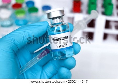 Herpes zoster vaccine in a vial, immunization and treatment of infection, vaccine used for disease prevention Royalty-Free Stock Photo #2302444547