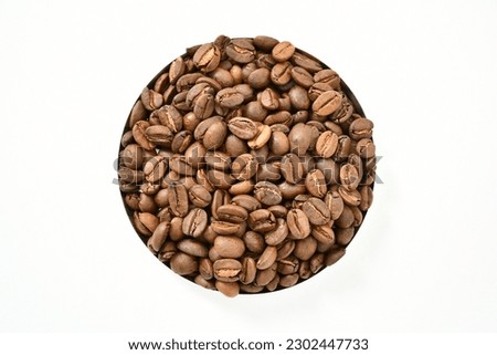 Roasted organic Cocoa Beans on white Background Stock Photo, Picture. top view. 