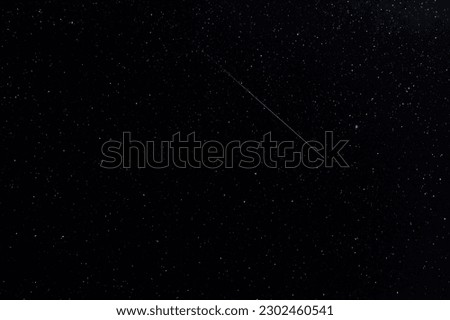 night starry sky and a passing meteorite. Background abstract image