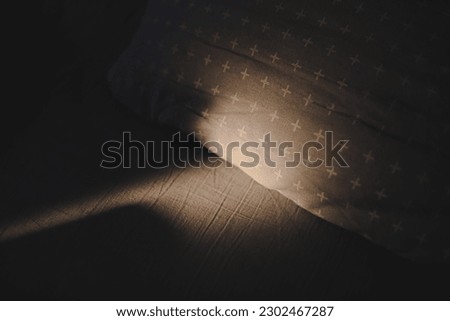 Some sunlight and shadows on bed linen . Crumpled blanket on morning bed , unmade bed. good morning concept Royalty-Free Stock Photo #2302467287