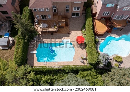 Experience ultimate relaxation in  backyard oasis with a luxury swimming pool. From stunning drone, aerial pictures backyard   opulent luxury houses, patio , perfect gazebo combination. Modern, pool