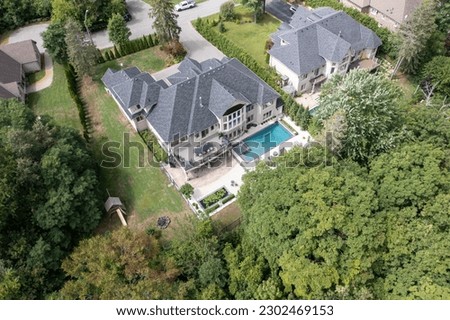 Experience ultimate relaxation in  backyard oasis with a luxury swimming pool. From stunning drone, aerial pictures backyard   opulent luxury houses, patio , perfect gazebo combination. Modern, pool