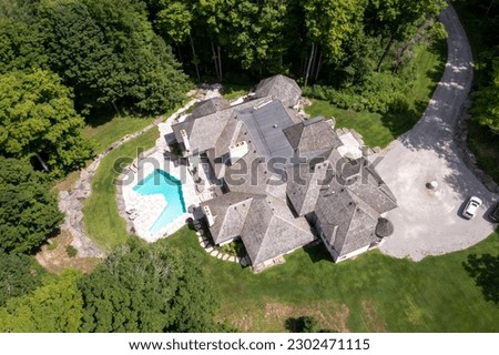 Experience ultimate relaxation in backyard oasis with a luxury swimming pool. From stunning drone backyard pictures opulent luxury houses, enjoy the perfect combination of comfort and style
