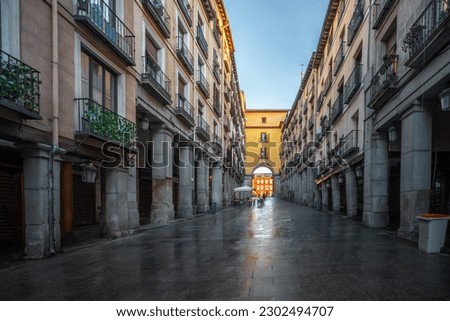 Calle de Toledo Street with Arches leading to Plaza Mayor - Madrid, Spain Royalty-Free Stock Photo #2302494707