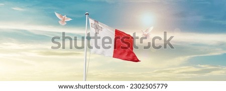 Waving flag of Malta in beautiful sky. Malta flag for independence day. Royalty-Free Stock Photo #2302505779
