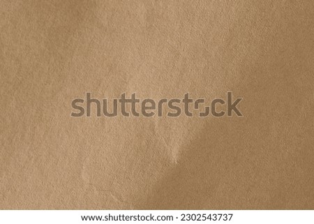 Brown rough crumpled recycled paper texture
