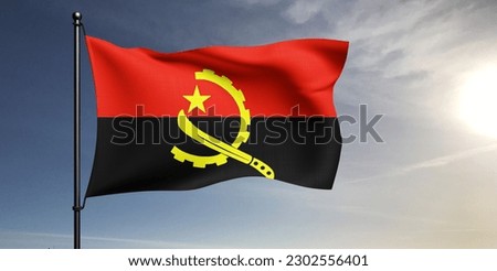 Angola national flag cloth fabric waving on beautiful sky grey Background.