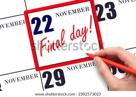 22nd day of November. Hand writing text FINAL DAY on calendar date November 22.  A reminder of the last day. Deadline. Business concept.  Autumn month, day of the year concept. Royalty-Free Stock Photo #2302573023
