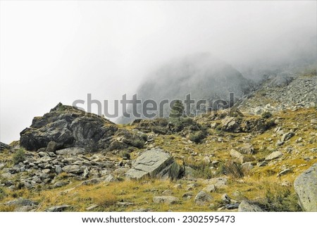 High mountain landscape with ominous clouds