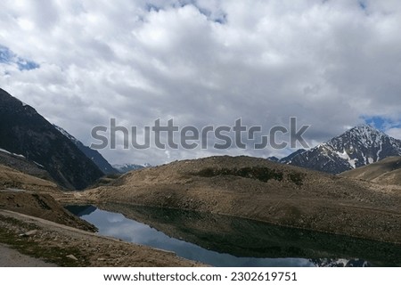On way to Khunjerab Pass on karakoram Highway (N-35) Silk Road. Babusar top, kaghan, Naran, Gilgit, Hunzawith beautiful view of Hills, mountains, Snow, Tree, Greenery, Lake, River and Stream 
