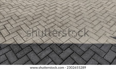 Abstract background of the pavement arrangements in on pedestrian street of urban housing area