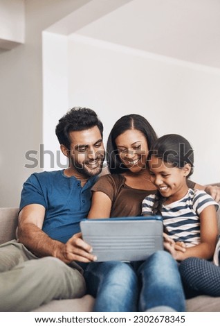 Family on a couch, happiness and tablet with connection, social media and watching a cartoon. Parents, mother and father with female child, daughter or technology for a movie, film or bonding at home