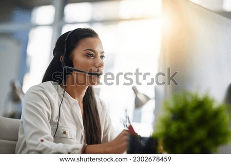 Communication, contact us or woman in call center consulting, speaking or talking at customer services. Virtual assistant, girl or sales consultant in telemarketing or telecom company help desk Royalty-Free Stock Photo #2302678459