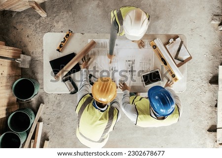 Top view, construction workers or blueprint planning in house, home or office building in real estate, property or architecture innovation. Men, engineering woman or construction site people or ideas Royalty-Free Stock Photo #2302678677
