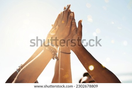 Hands, high five and closeup group of people outdoor for solidarity, trust and goal collaboration. People, commitment and friends with hand in support of success, celebration and partnership or unity Royalty-Free Stock Photo #2302678809